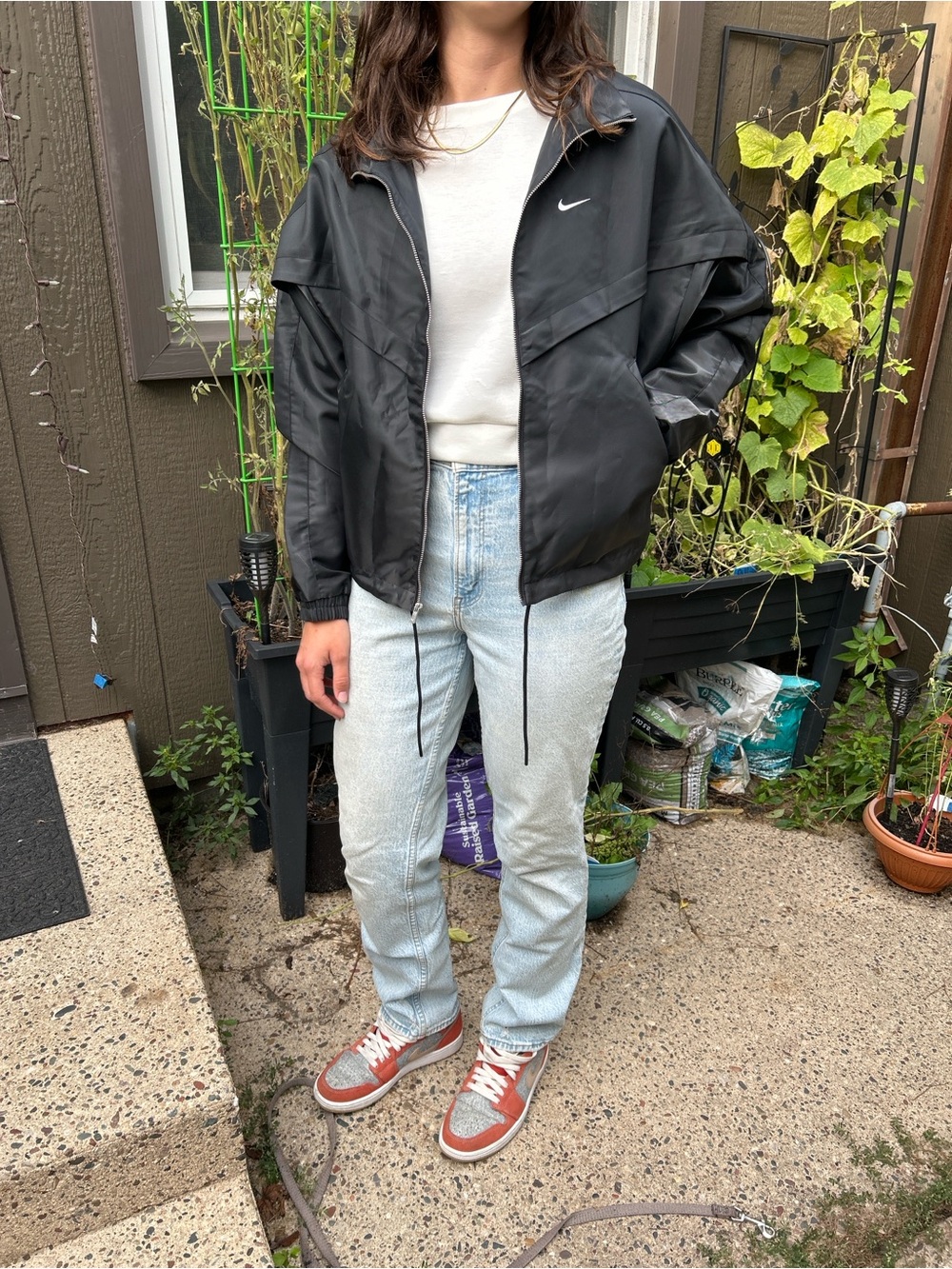 Nike Womens Medium (oversized fit) Black Windbreaker Jacket with Subtle Swoosh